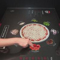 Design your pizza using digital table pizza hut