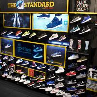Adidas interactive screens in Foot Locker stores